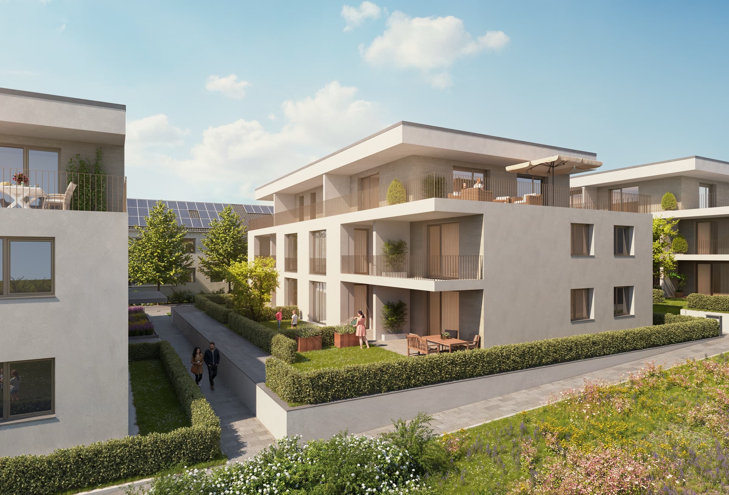 Mehrfamilienhäuser mit Dachterrassen und Gärten